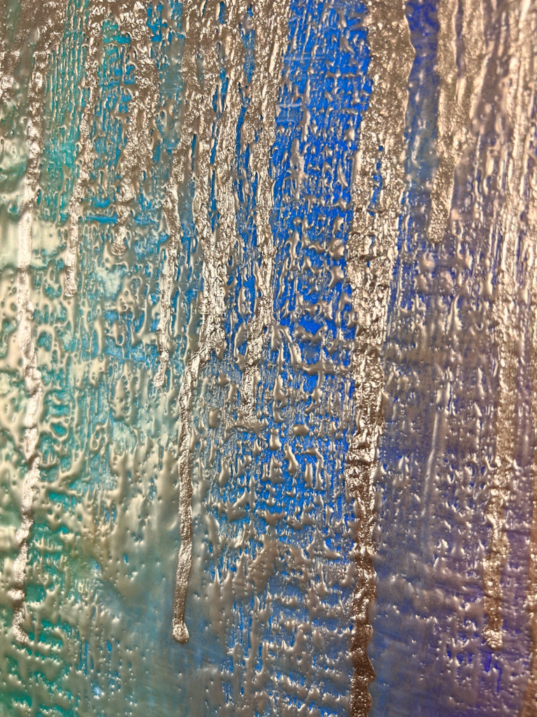 Close-up of Gilded Joy showing the texture of the work and highlighting the two types of gold used.
