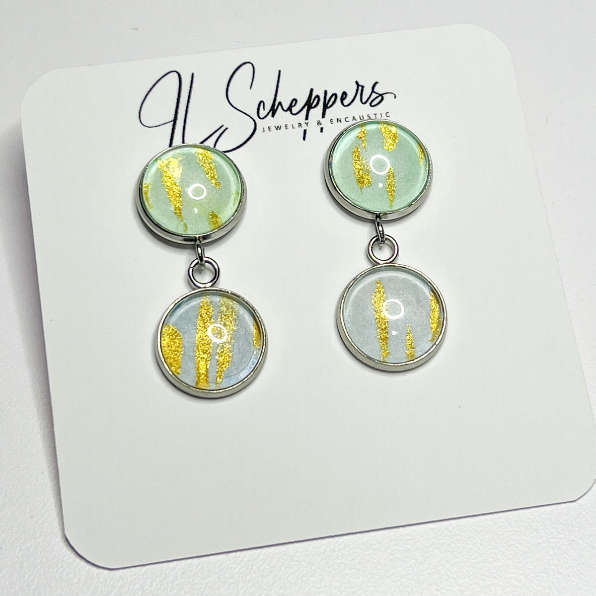 Phoebe earrings shown on an earring card. 
