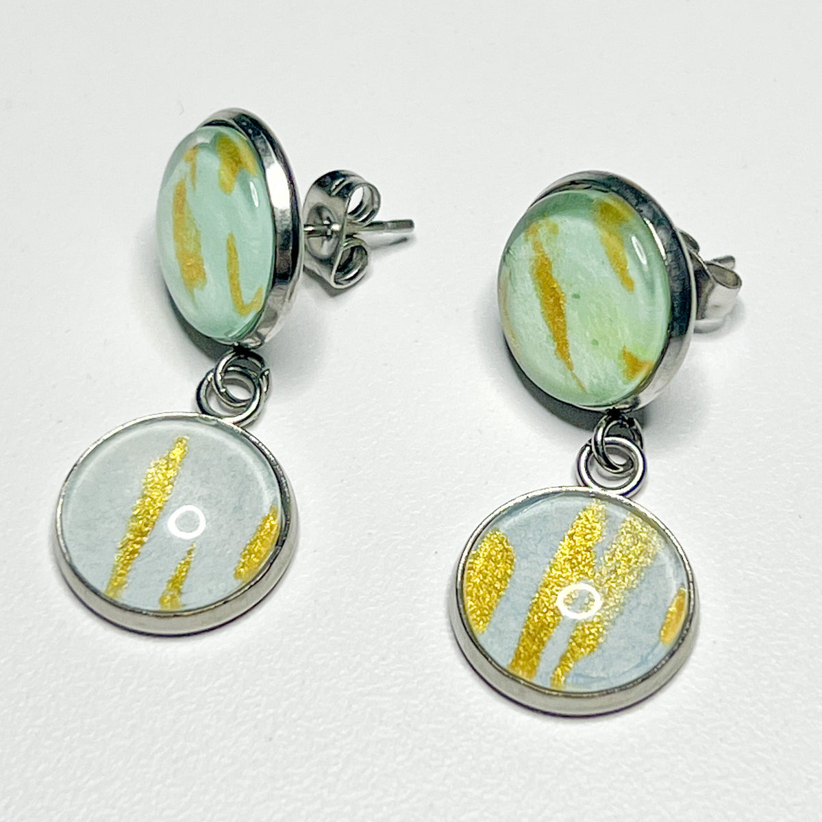 Phoebe earrings shown on white background. 