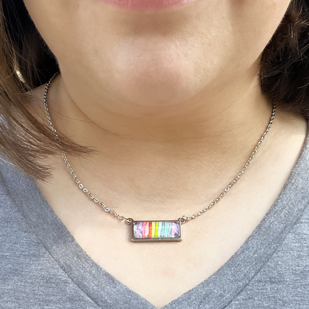 Spectrum necklace shown on model. 