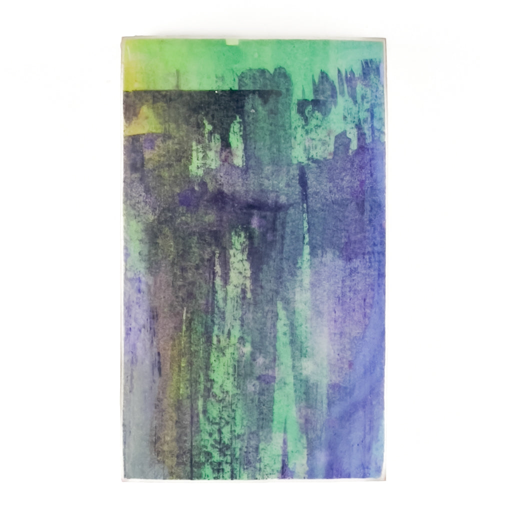 Front view of watercolor and encaustic painting, featuring layered shades of blues and greens.