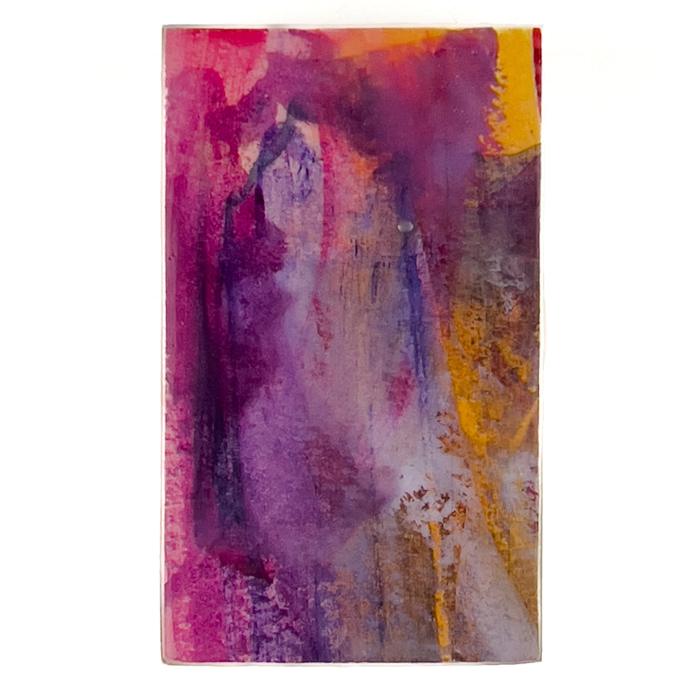Front view of watercolor and encaustic painting, featuring layered shades of  pinks, purples and orange. 