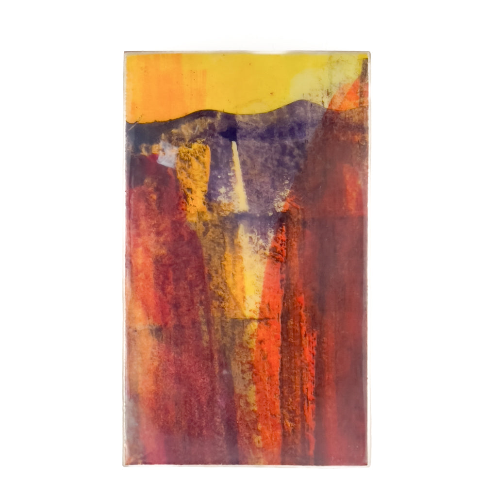 Front view of watercolor and encaustic painting, featuring layered shades of orange, yellow and red.. 