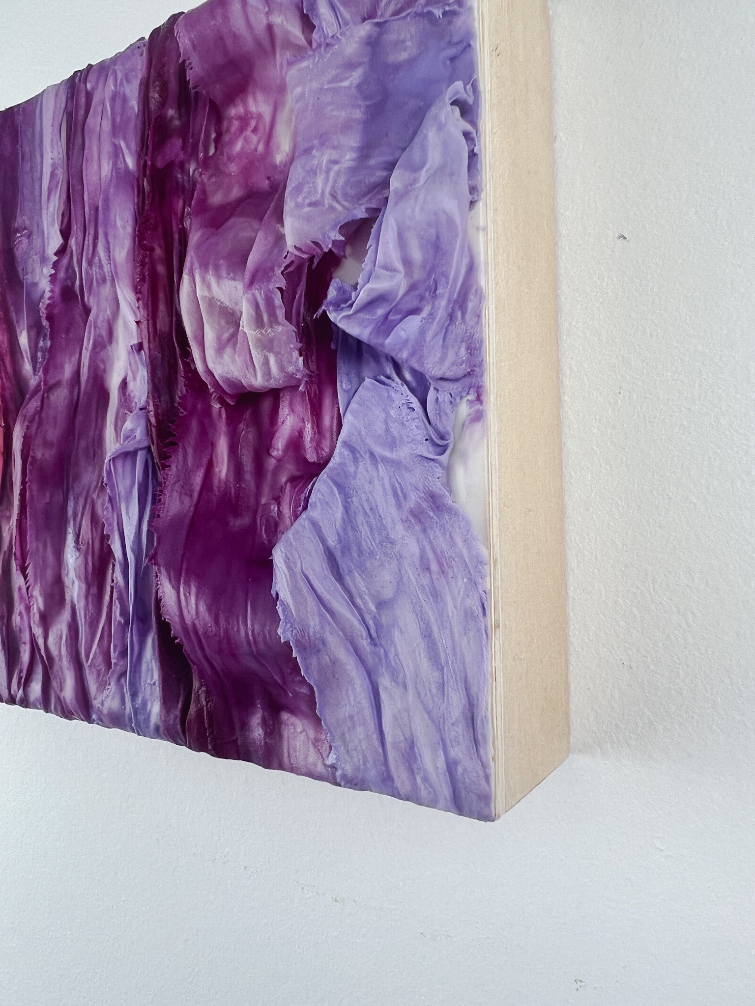 6-inch square purple encaustic and ribbon painting. 
