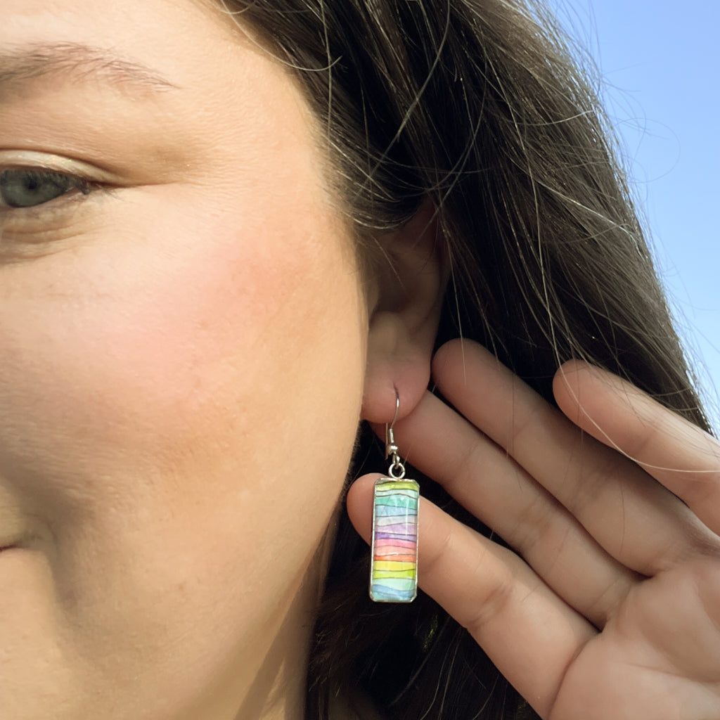 Rectangular hand-painted rainbow watercolor earrings. 