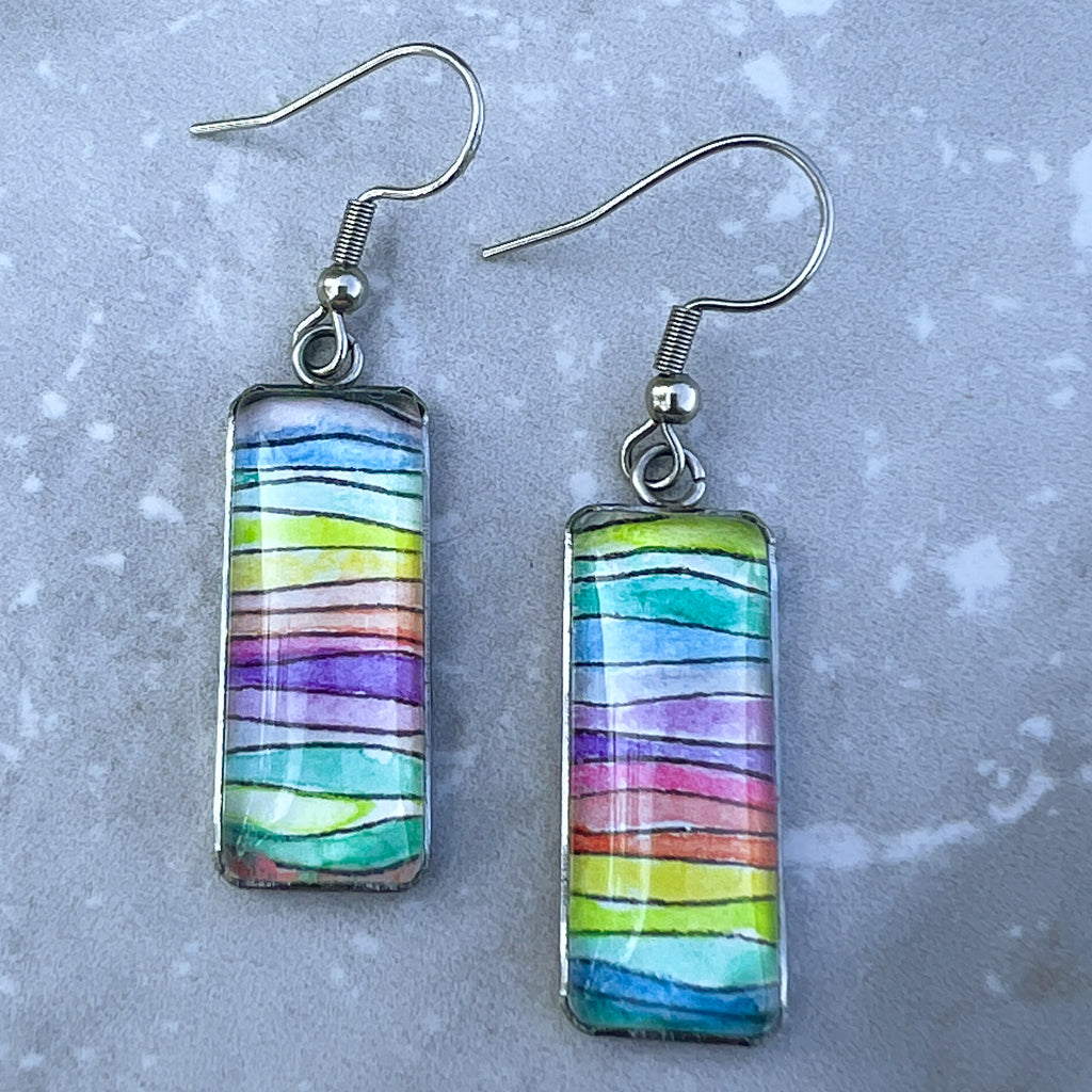 Rectangular hand-painted rainbow watercolor earrings. 